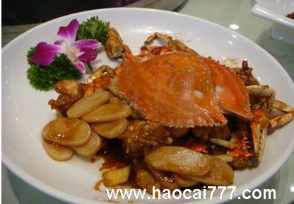 蟹炒年糕的做法，很经典的螃蟹吃法